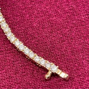 GLd ladies 9” CZ tennis bracelet in yellow gold. NWOT